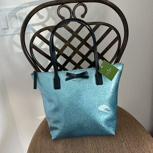 NWT Jeralyn Mavis Street light blue glitter bag.